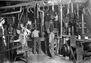 FACTORY WORK IN THE INDUSTRIAL REVOLUTION WAS EXHAUSTING AND UNSAFE, LIKE IN MANY FACTORIES AROUND THE WORLD TODAY